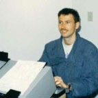 Steve-LaserMedia-jonos Me sitting at a Military grade portable, modular computer