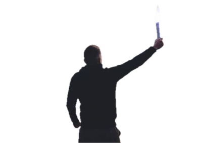 Silhouette of a man facing away holding a torch